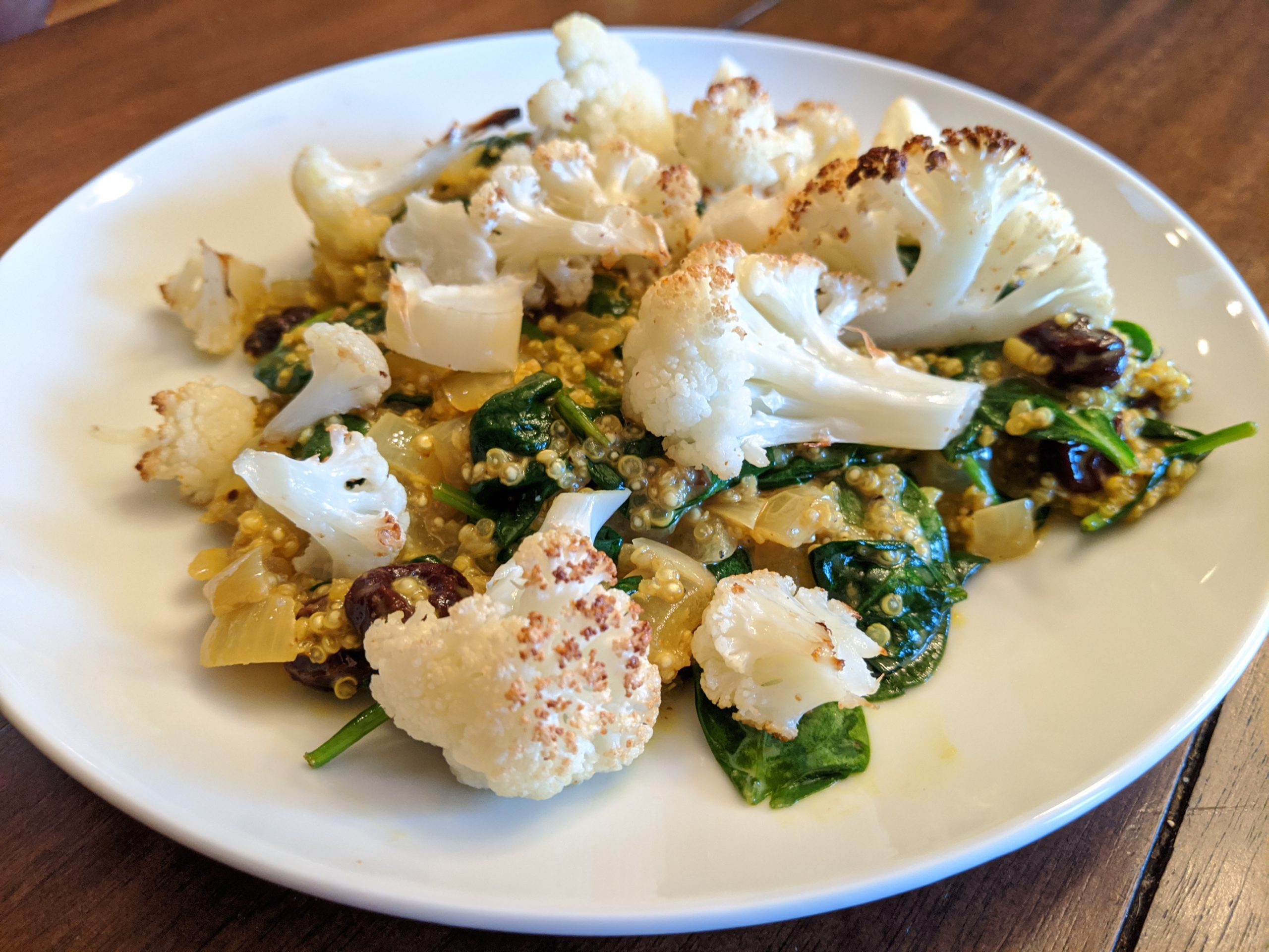 Roasted Cauliflower Over Curried Quinoa